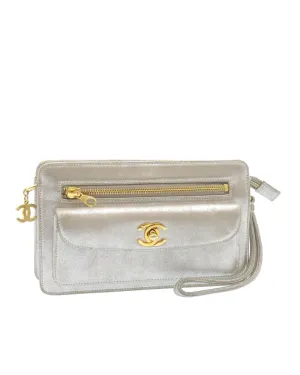 Authentic Chanel Silver Leather Clutch Bag with CC Logo