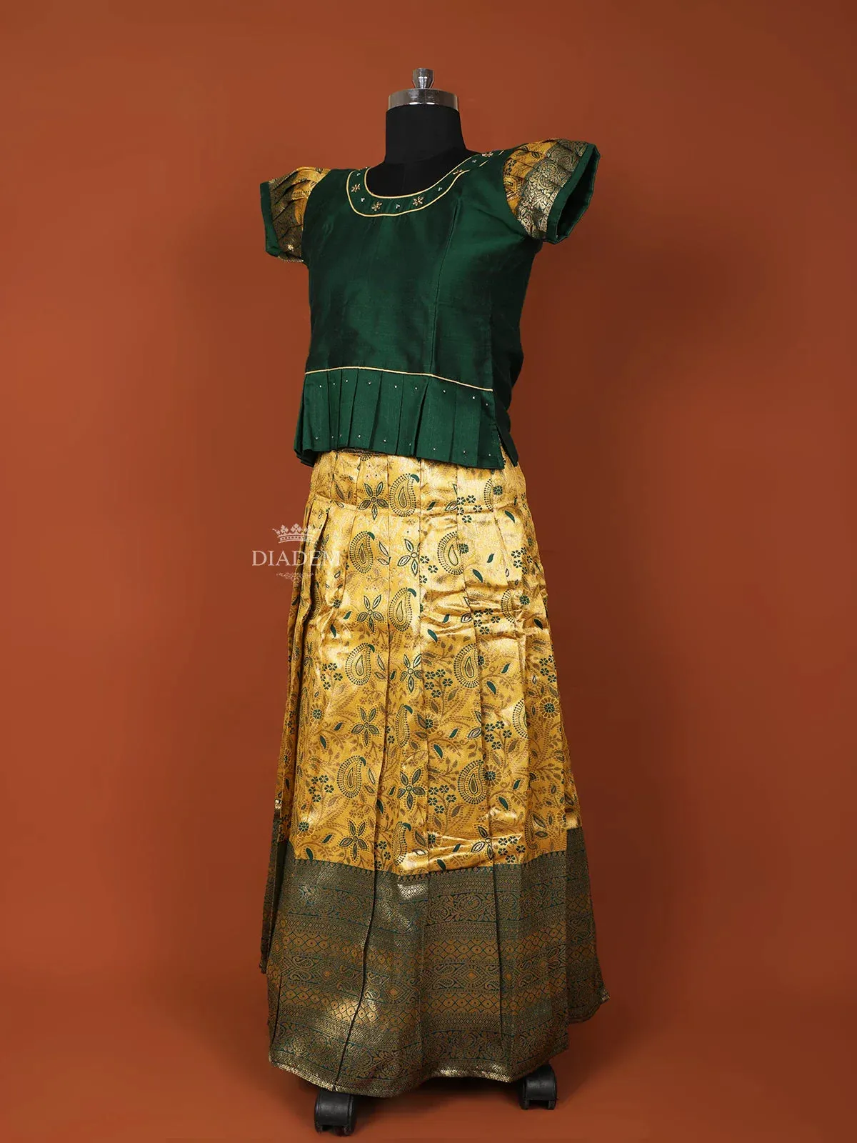 Dark Green Silk Pattu Pavadai Set Adorned with Stones and Zariwork