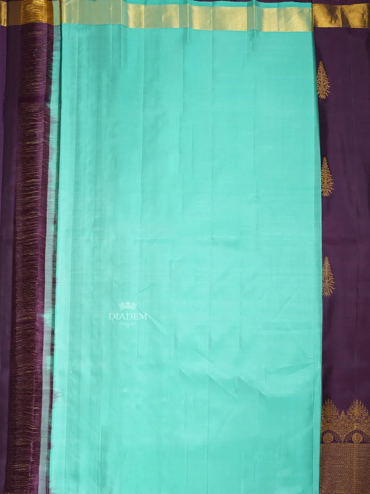 Dark Purple Pure Kanchipuram Silk Saree With Leaf Motifs On the Body with Broad and Small Border